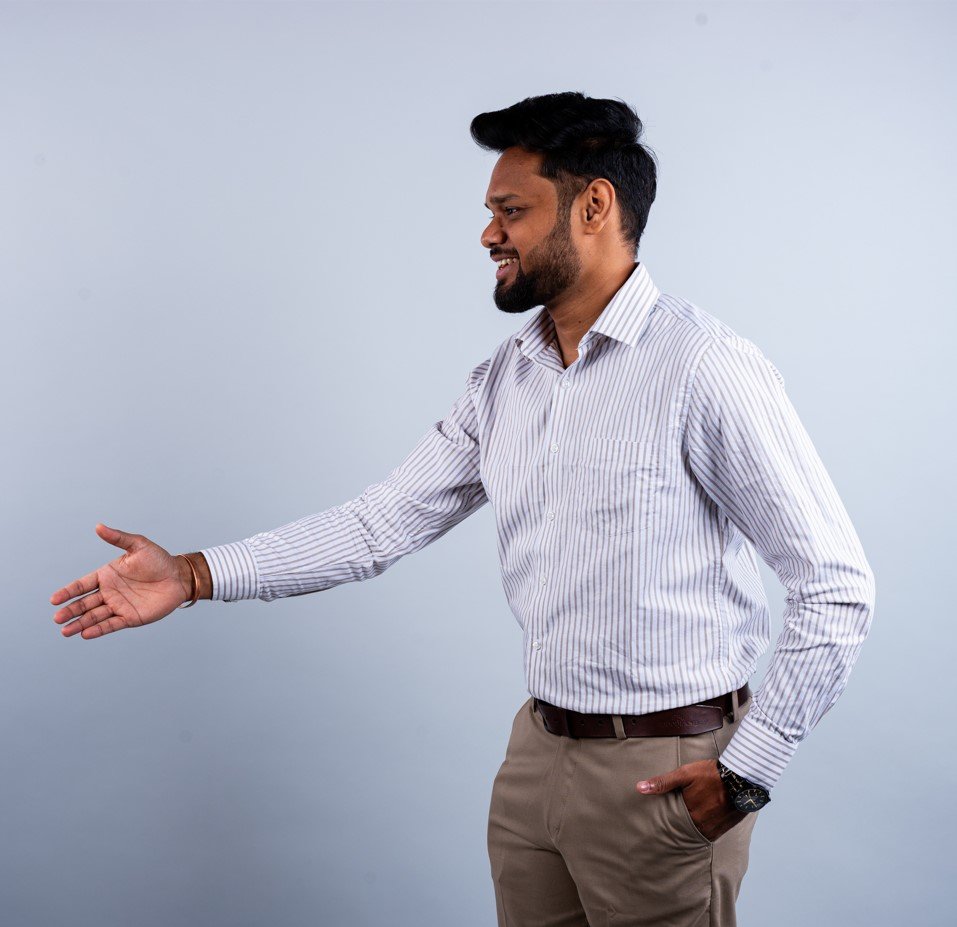 Naman Nandurkar, Founder and CEO of Octmi, speaking with a hand gesture during a professional studio shoot